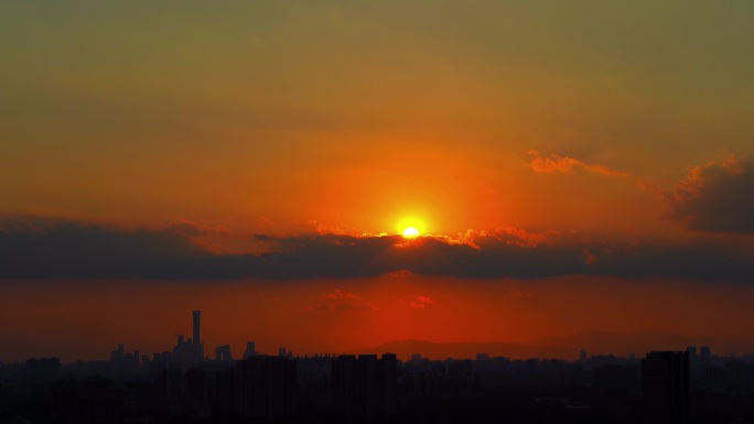 夕阳落日城市北京地标剪影