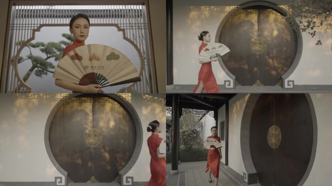 中国风旗袍美女纸扇走路