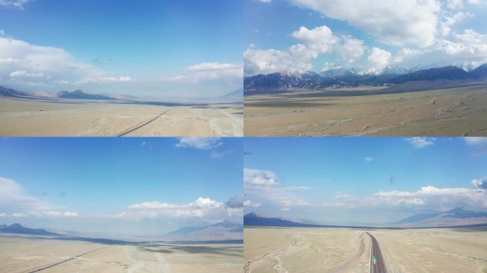 新疆天山空旷戈壁蓝天白云雪山卡车航拍4K
