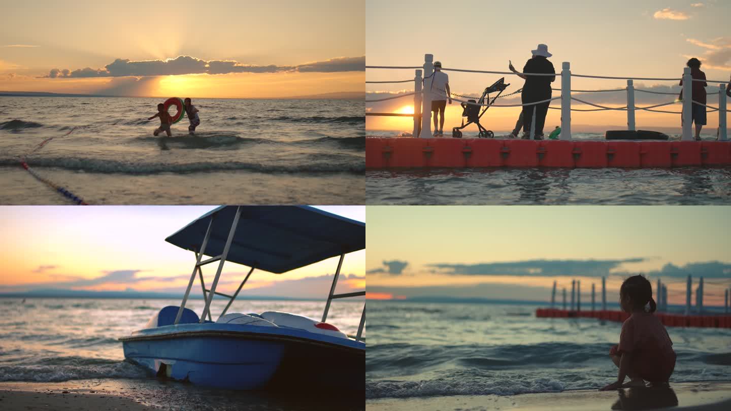 沙滩 夕阳 日落 船 海 游客