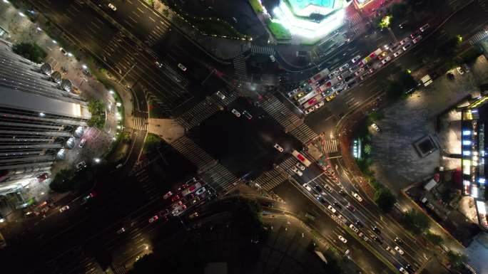 城市十字路口斑马线车流夜景航拍延时摄影