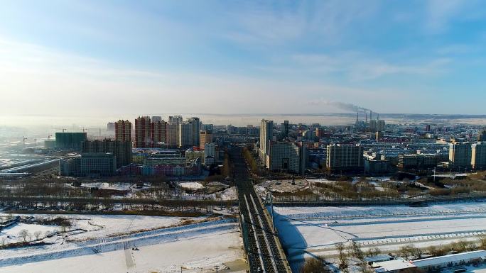 航拍冬季冰雪覆盖的黑河市黑龙江