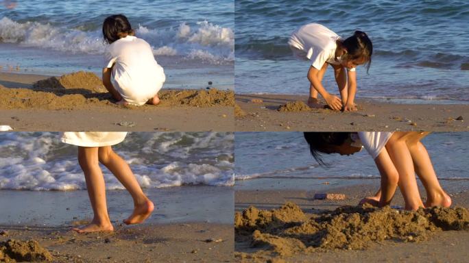 小女孩海边沙滩上玩沙子