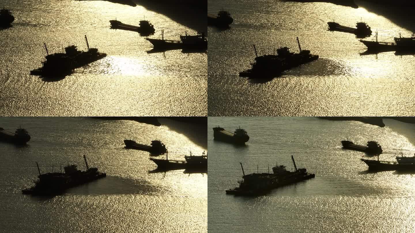 波光粼粼海上夕阳渔船