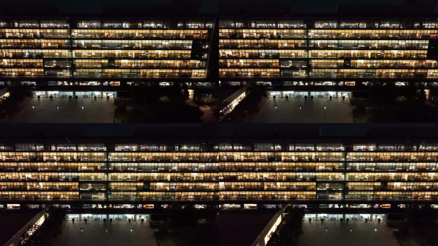 4K原素材-航拍灯光通明的写字楼夜景