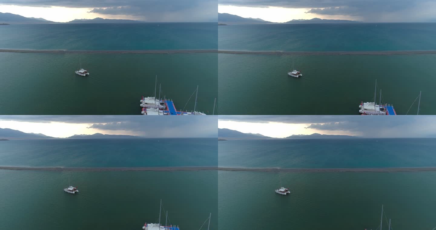 游船回港新疆赛里木湖游艇码头航拍风景
