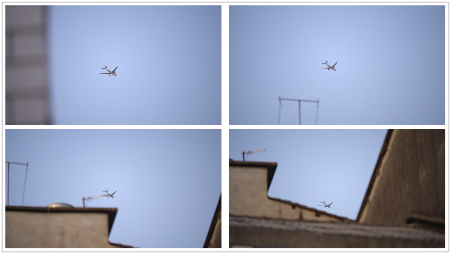 飞机飞过居民楼屋顶