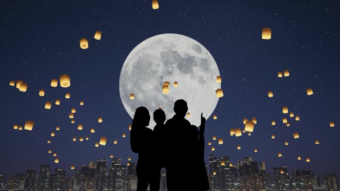 中秋节一家人团圆赏月许愿欣赏孔明灯升起
