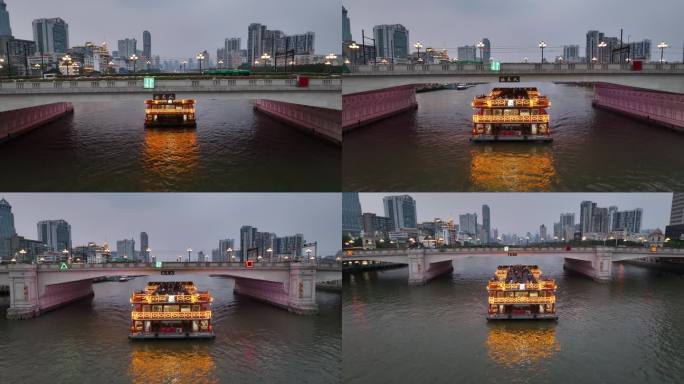 航拍广州珠江夜游游船穿行人民桥
