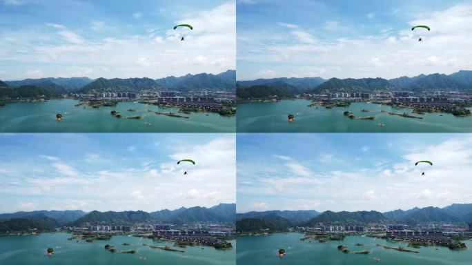 航拍千岛湖上空滑翔伞