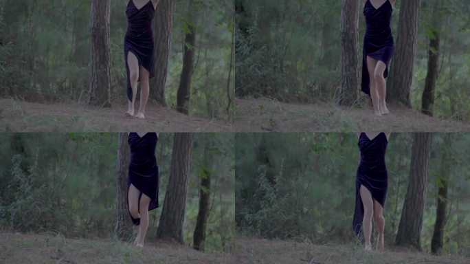 女孩光脚在森林里行走