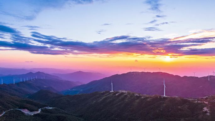 原创雪峰山苏宝顶大风车落日延时摄影