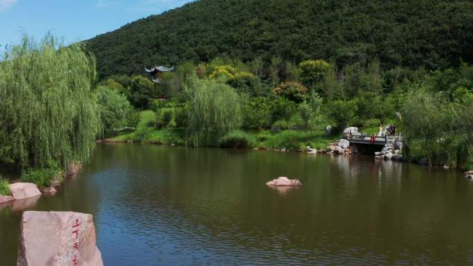 航拍大连横山寺景区湖泊亭子山水