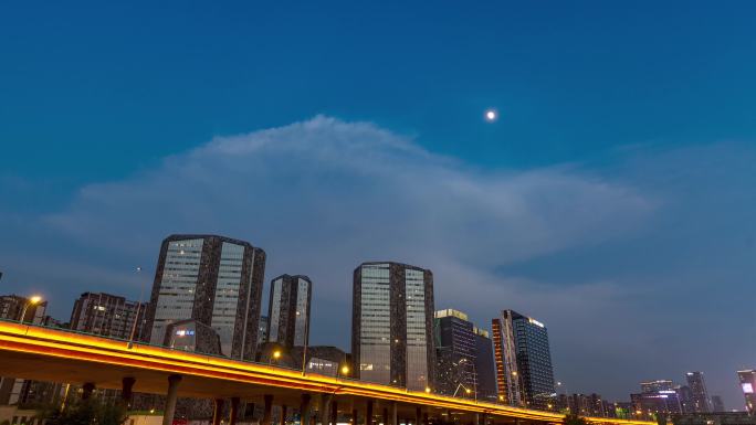 成都高新区建筑交通月亮升起城市夜景延时