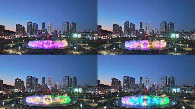 城市夜景下的音乐喷泉表演