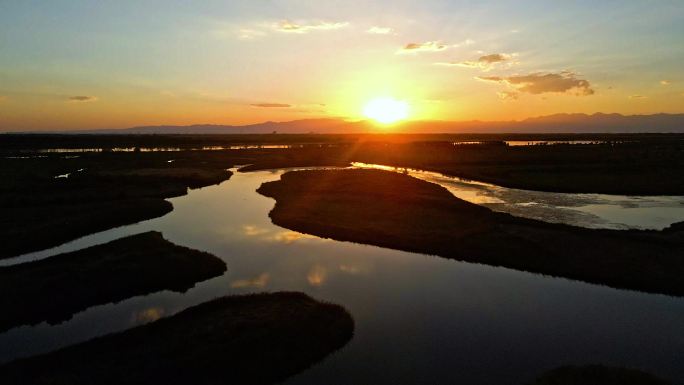 夕阳黄河蜿蜒湿地湖泊芦苇荡