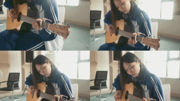 4K学校教室女高中生弹吉他影视素材