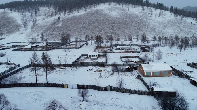 航拍东北林区雪村风光