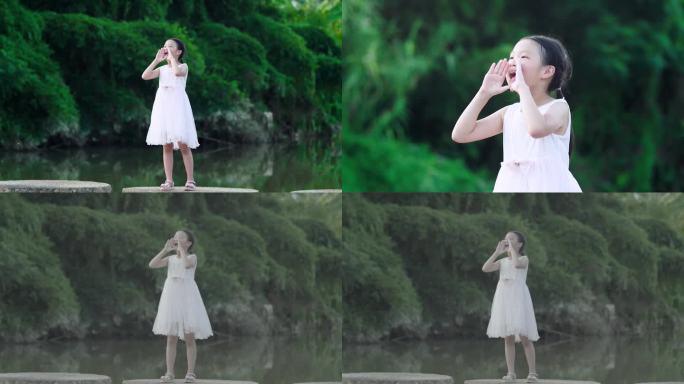 小女孩在绿色山林间向着远方呐喊