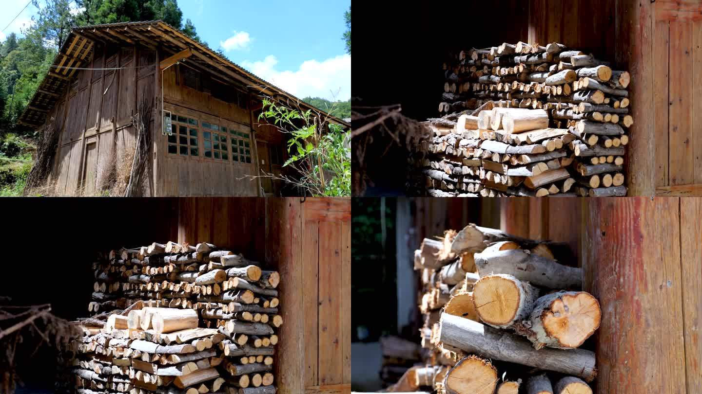 村庄木房子旁边一堆柴