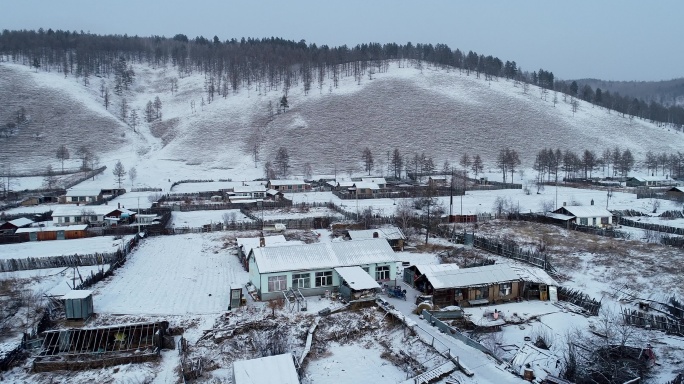 航拍东北林区雪村风光