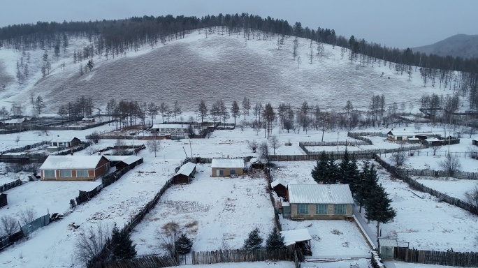 航拍东北林区雪村风光