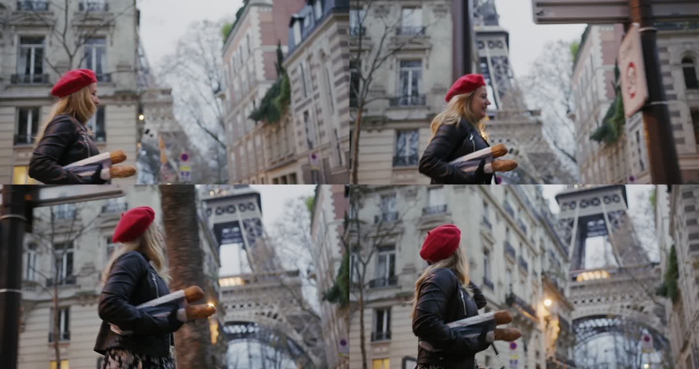 SLO-MO：一位迷人的法国女士沿着埃菲尔铁塔携带法式面包