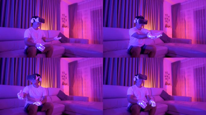 一名亚洲年轻男子在网上约会时戴着虚拟现实眼镜