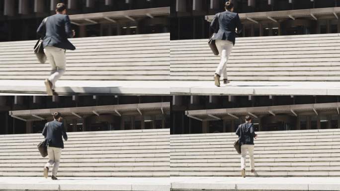 一个商人在城市背景下跑上楼梯的4k视频片段