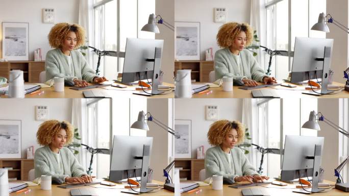 自信的非洲女商人使用电脑
