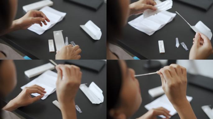 亚洲妇女使用抗原测试试剂盒