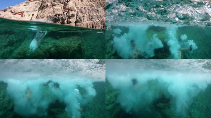 在希腊Zakynthos，一对相爱的情侣享受暑假，在海水中跳跃和游泳的4K视频