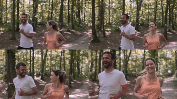 一对快乐的运动情侣一边在大自然中跑步一边聊天。