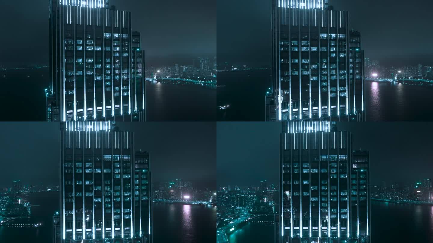 香港夜晚摩天大楼的现代玻璃画面