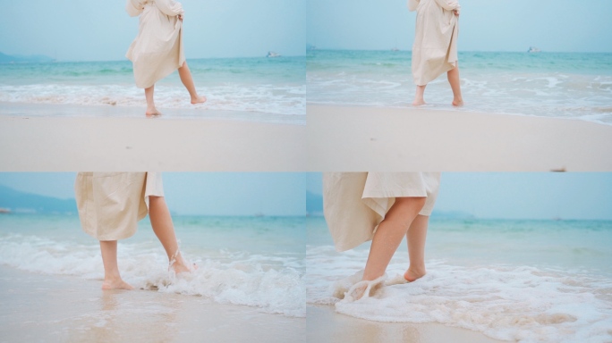 美女海边散步漫步玩水
