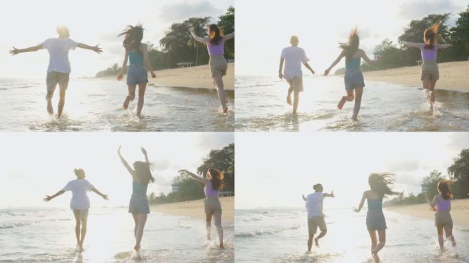 一群亚洲年轻男女一起在海滩上跑步。吸引人的朋友：旅行者在海边散步和玩耍时感到快乐，在热带海岛享受假期