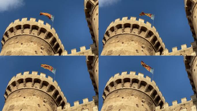瓦伦西亚国旗在中世纪的塔顶上飘扬