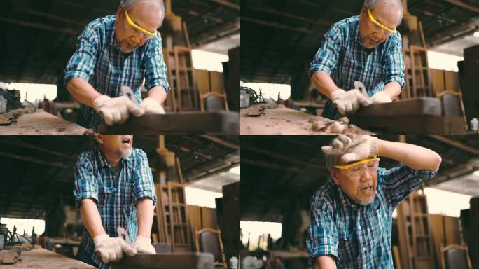 高级技工专注于他的木材工作。