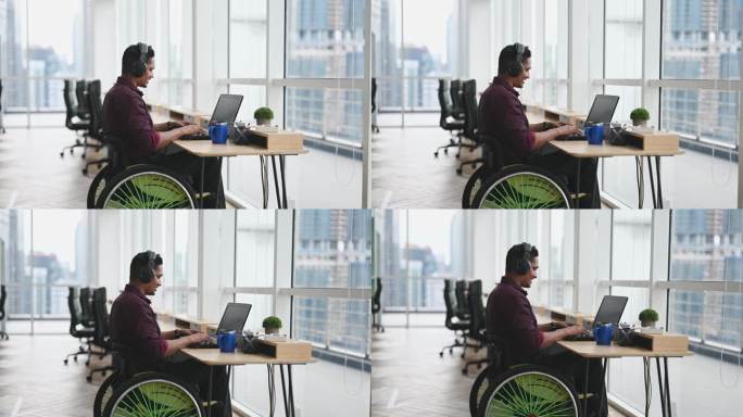 亚裔印度男性残疾白领坐在轮椅上，与商业伙伴通过视频会议与摄像机交谈