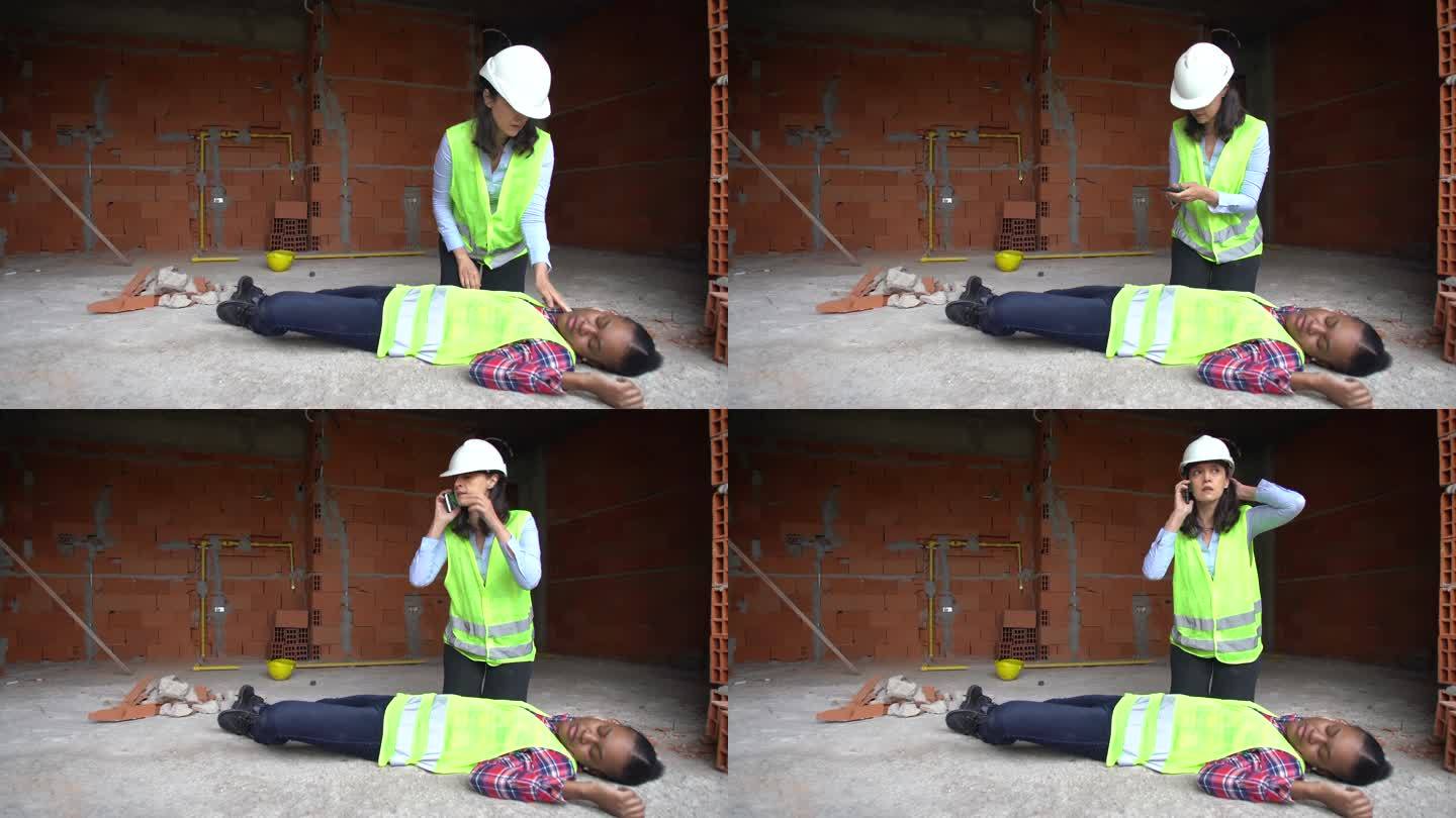 一名妇女试图救活失去知觉的工人，并在施工现场呼叫急救服务