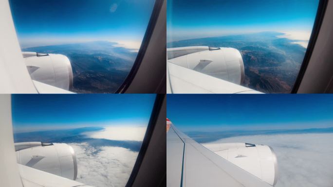 飞机客机云端之上窗外云海实拍