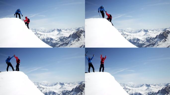 互相帮助的登山者到达了白雪覆盖的山峰