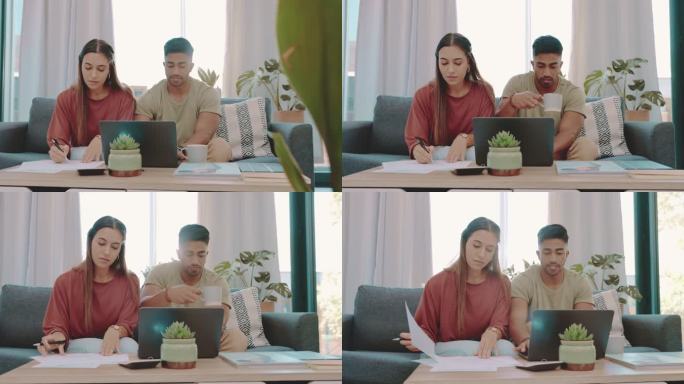 一对年轻夫妇坐在一起用笔记本电脑计算财务的4k视频片段