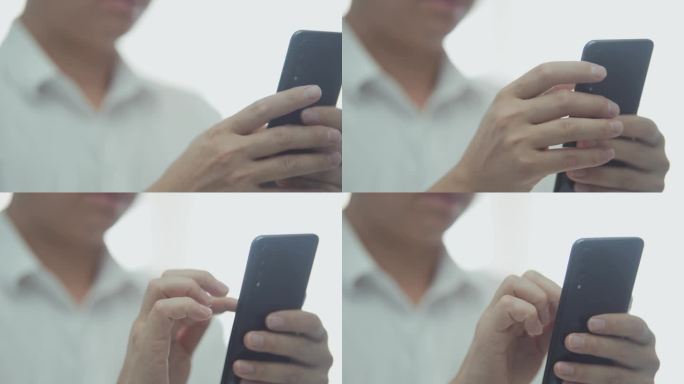 男人玩手机职场白领手机聊天手机游戏刷手机