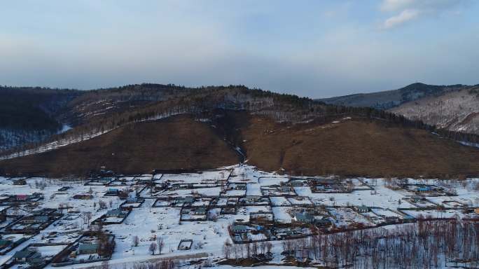 航拍东北林区雪村风光