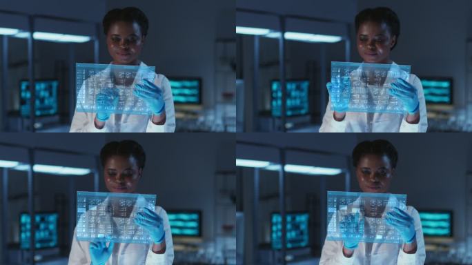 一位年轻漂亮的非洲裔美国科学家，穿着实验室外套，戴着防护手套，在现代实验室中的未来HUD屏幕上工作。