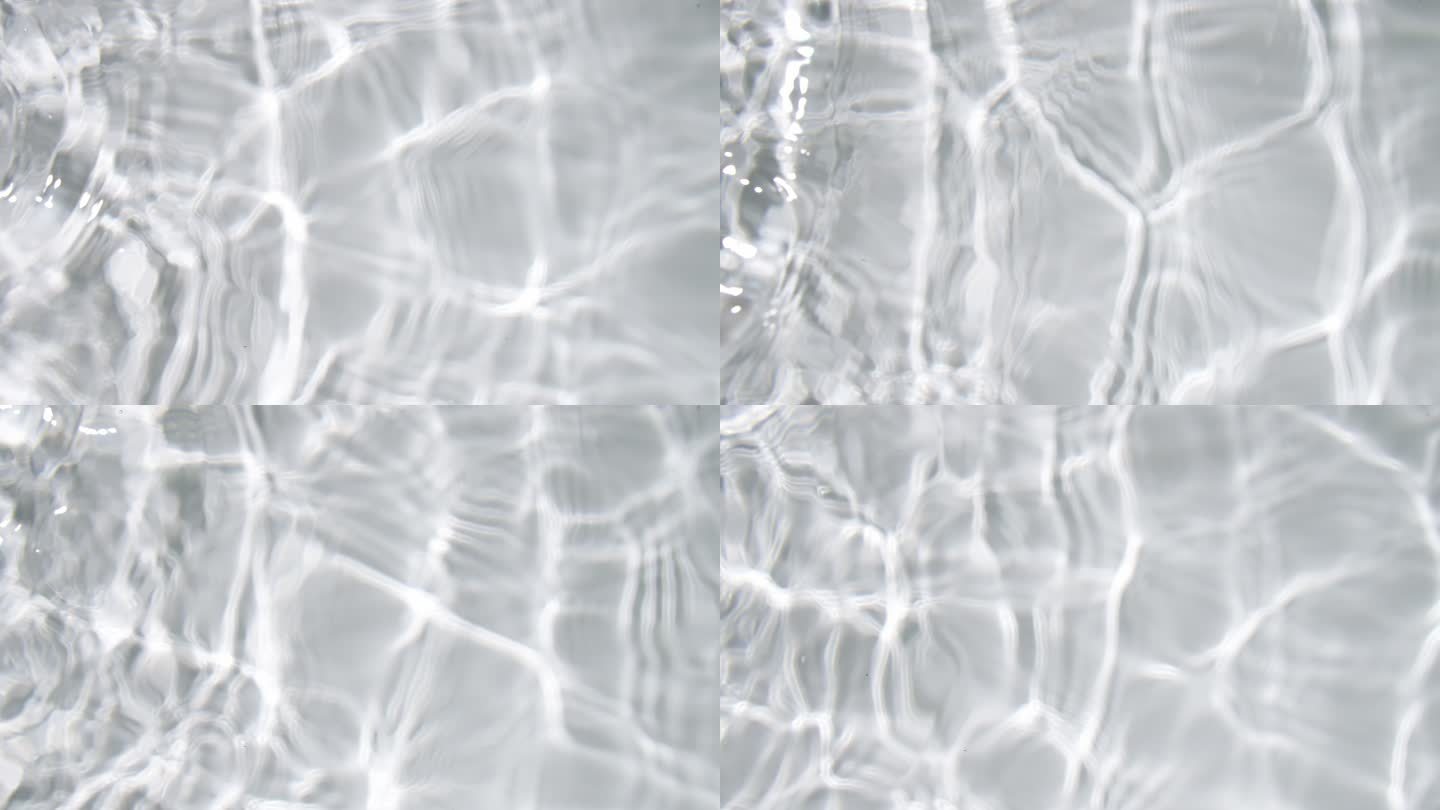 清澈的水面上有涟漪，从白色浴缸的左侧方向到水面平静