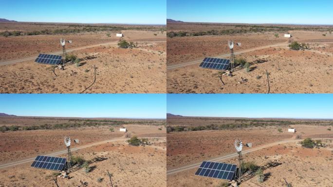 在南非干燥的卡鲁，太阳能电池板取代了旧风车