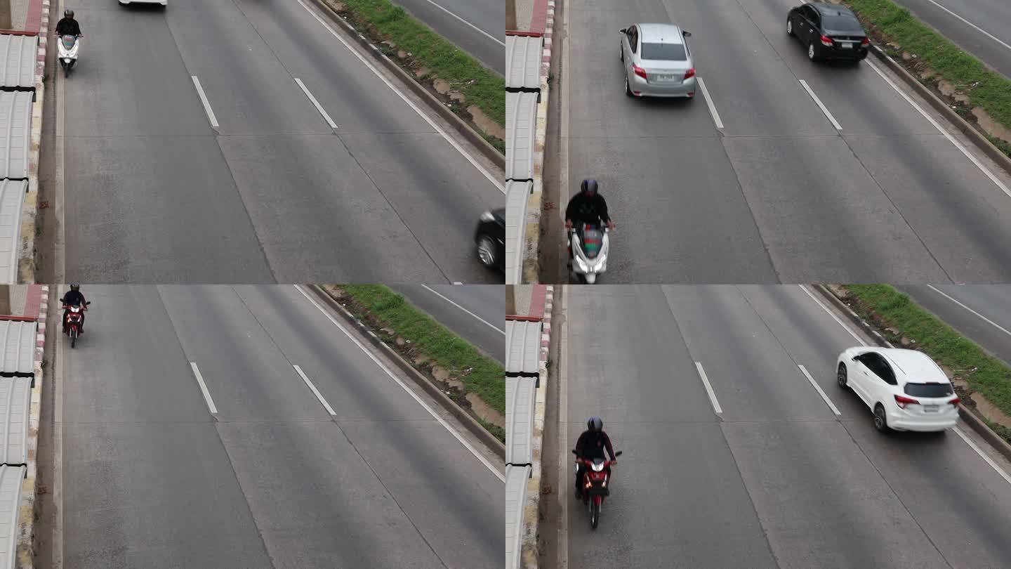 有两个人驾驶摩托车走错了方向，这是交通违法的概念。