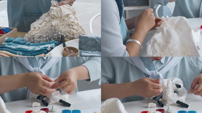 女子蜡染刺绣缝补视频
